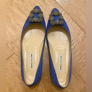Manolo Blahnik flats.
